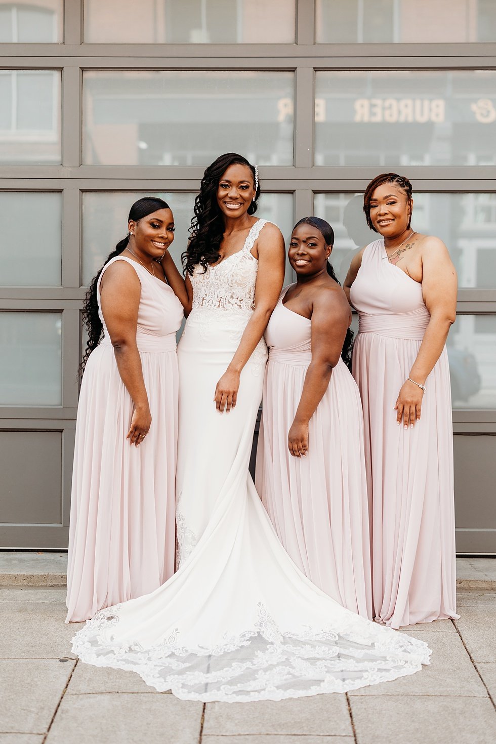  Bride and bridesmaids photos in downtown louisville, Kentucky. Rooftop wedding and reception at 21C Hotel Louisville 