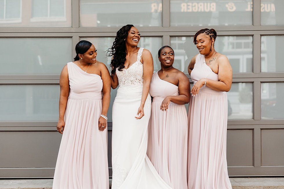  Bride and bridesmaids photos in downtown louisville, Kentucky. Rooftop wedding and reception at 21C Hotel Louisville 