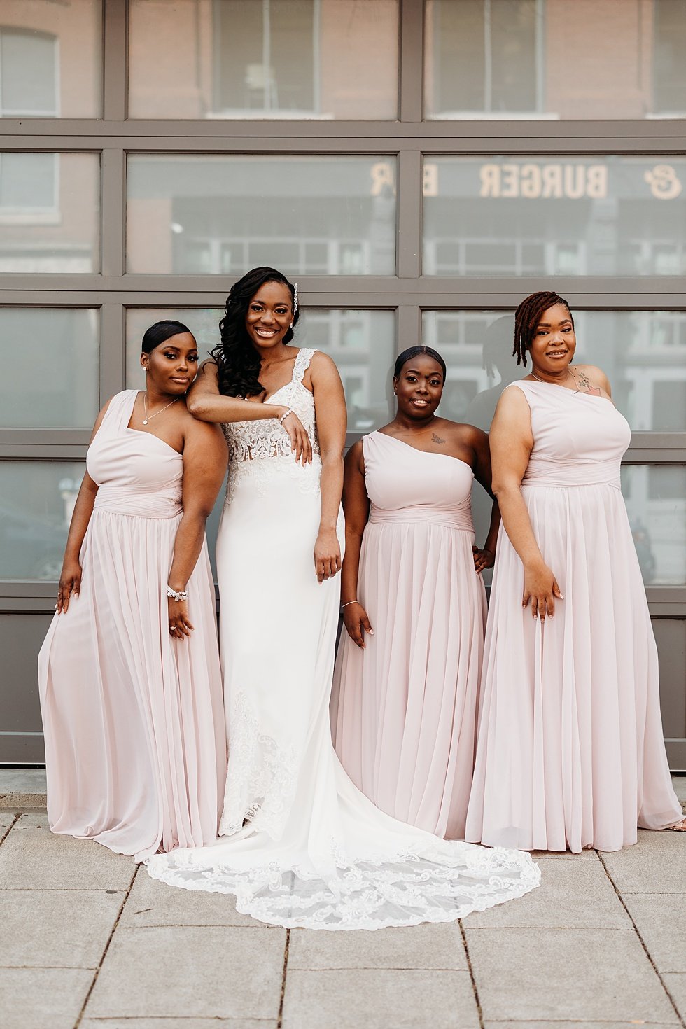 Bride and bridesmaids photos in downtown louisville, Kentucky. Rooftop wedding and reception at 21C Hotel Louisville 