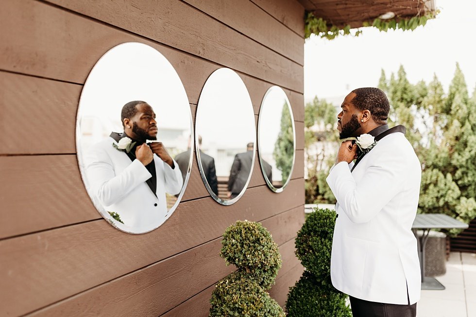  Groom getting ready. Rooftop wedding and reception at 21C Hotel Louisville 