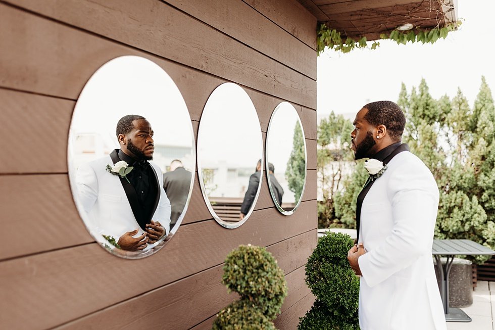  Groom getting ready. Rooftop wedding and reception at 21C Hotel Louisville 