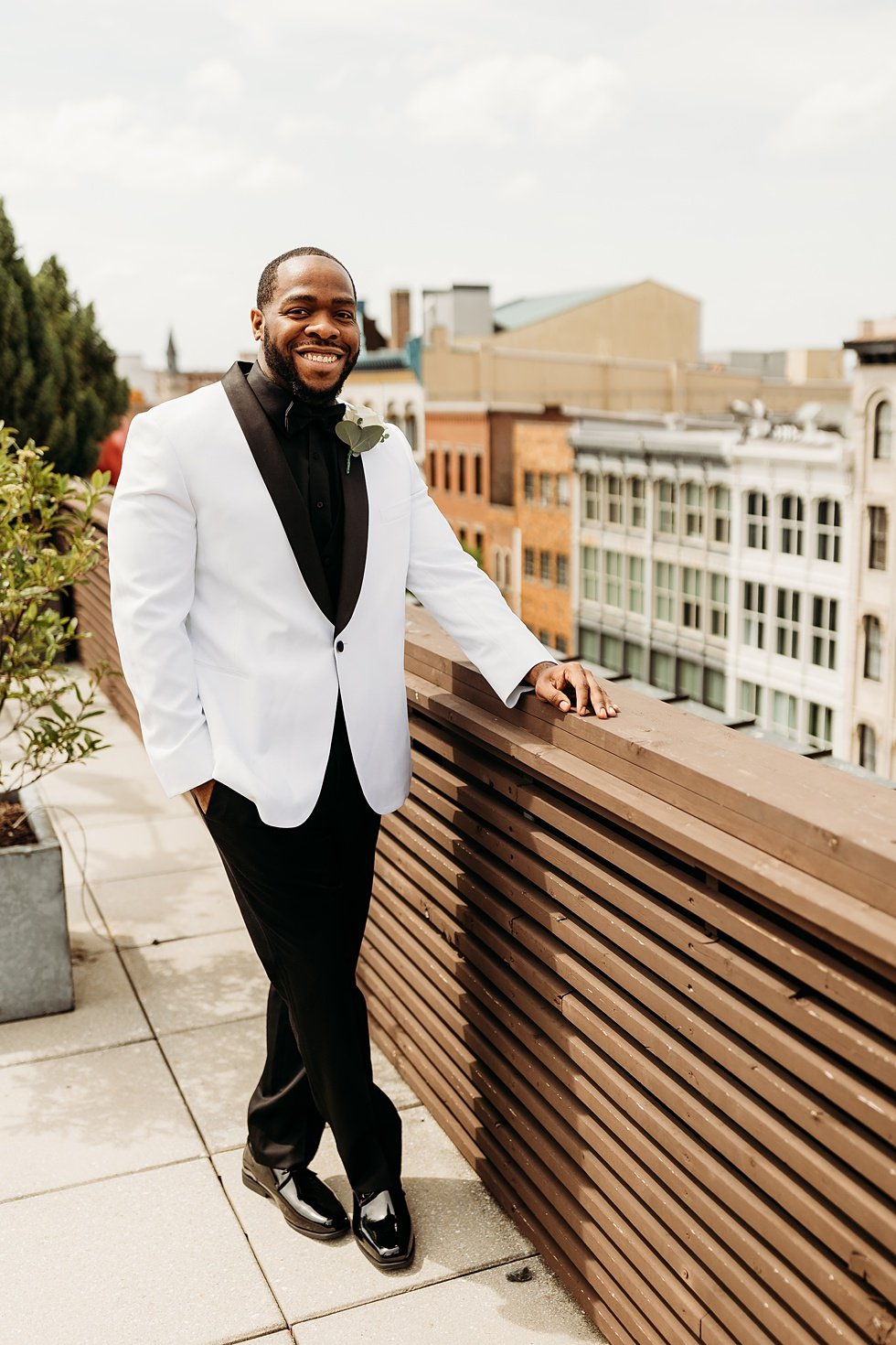  Groom portraits at 21c. Rooftop wedding and reception at 21C Hotel Louisville 