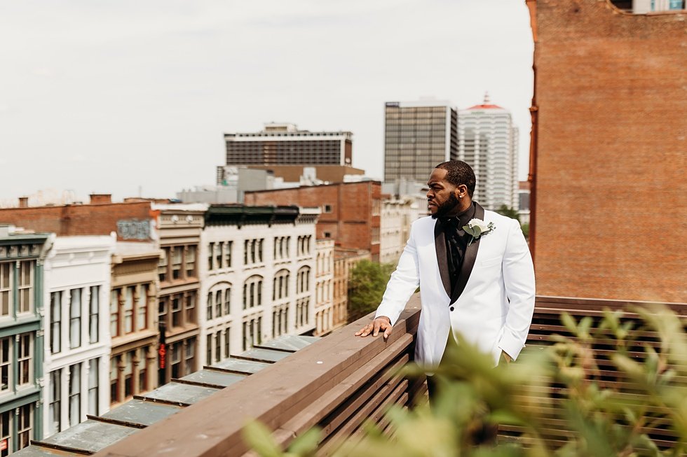  Groom portraits at 21c. Rooftop wedding and reception at 21C Hotel Louisville 