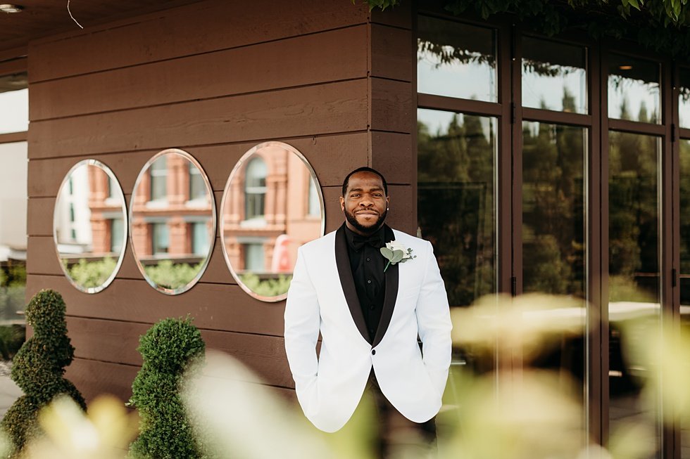  Groom portraits at 21c. Rooftop wedding and reception at 21C Hotel Louisville 