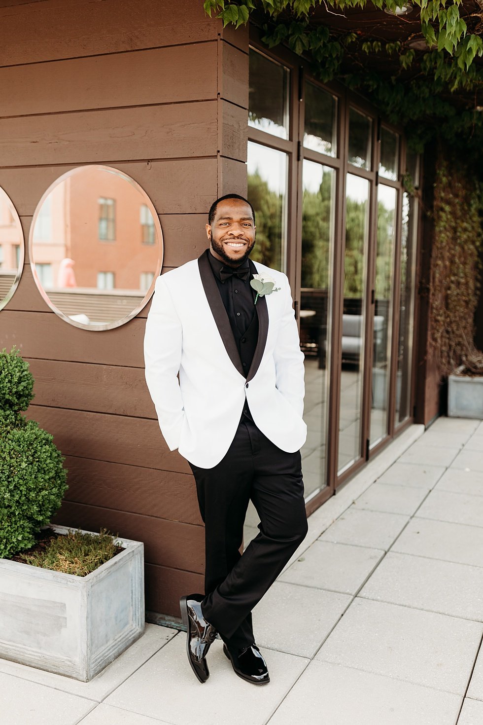  Groom portraits at 21c. Rooftop wedding and reception at 21C Hotel Louisville 