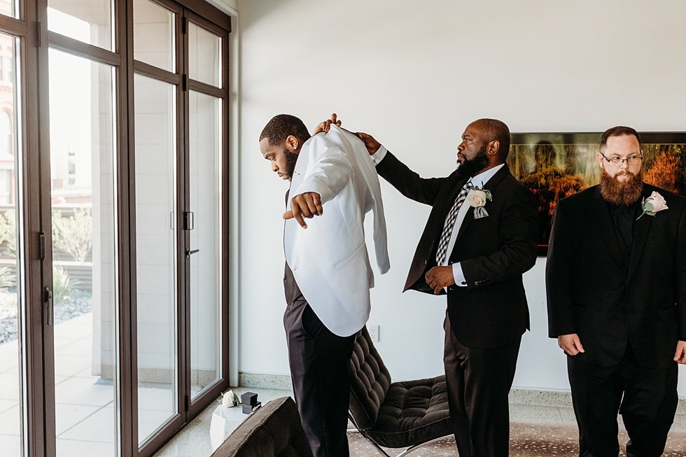  Groom portraits at 21c. Rooftop wedding and reception at 21C Hotel Louisville 