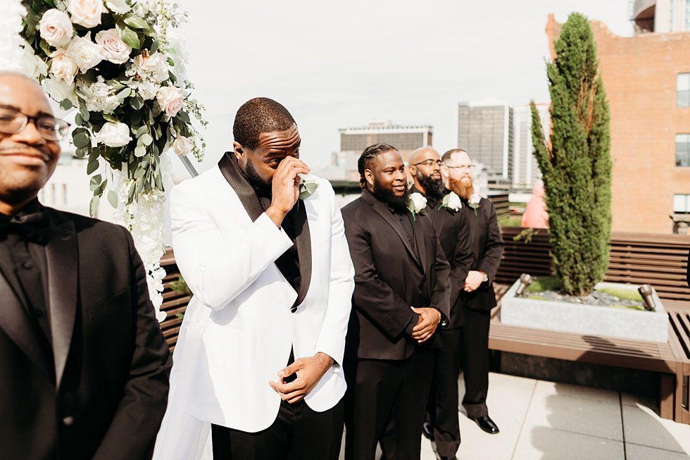  Rooftop wedding ceremony at 21c hotel Louisville.  