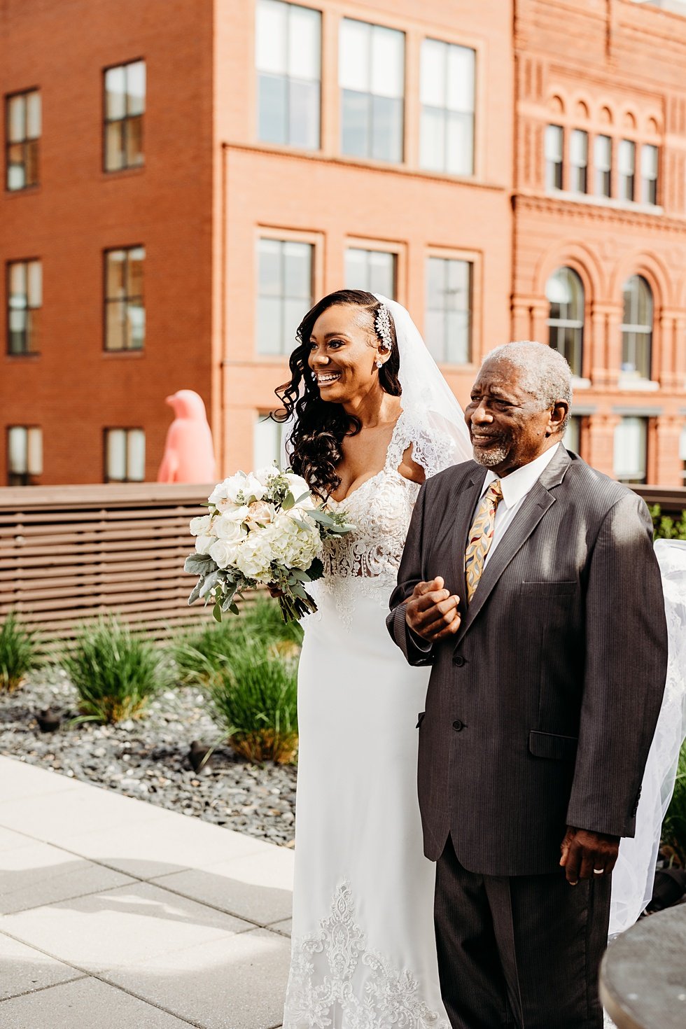  Rooftop wedding ceremony at 21c hotel Louisville.  
