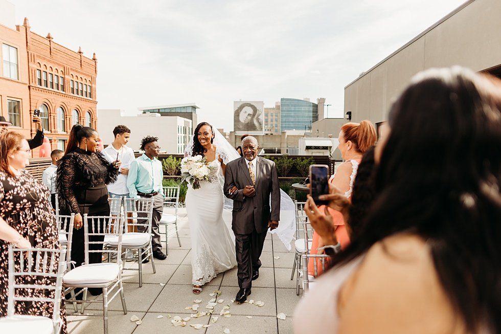  Rooftop wedding ceremony at 21c hotel Louisville.  