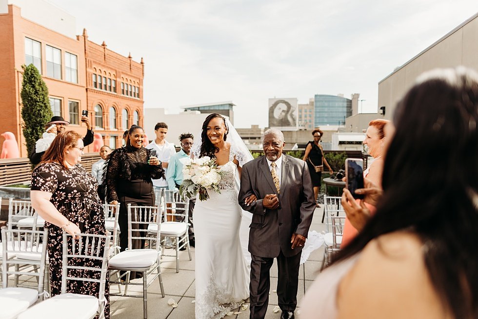  Rooftop wedding ceremony at 21c hotel Louisville.  