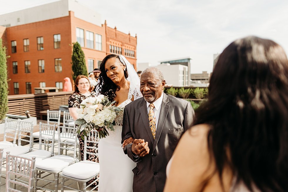  Rooftop wedding ceremony at 21c hotel Louisville.  