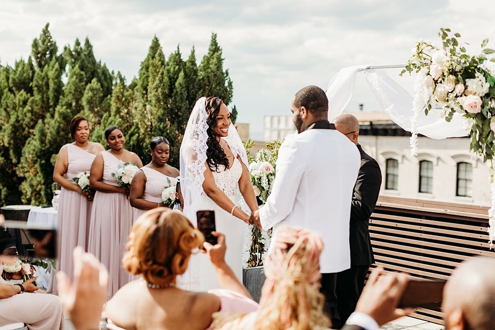  Rooftop wedding ceremony at 21c hotel Louisville.  