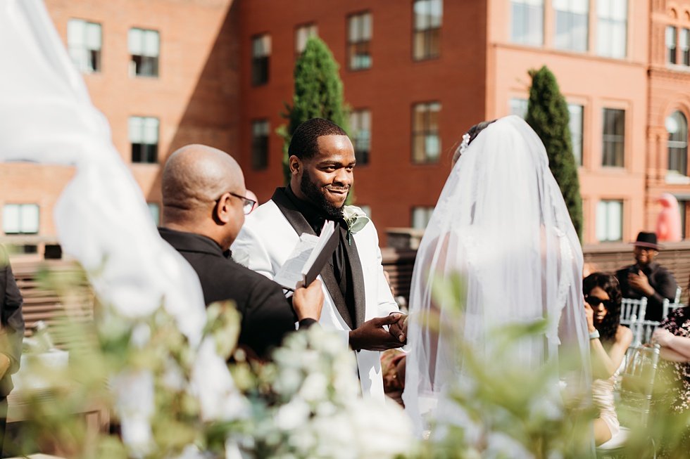  Rooftop wedding ceremony at 21c hotel Louisville.  