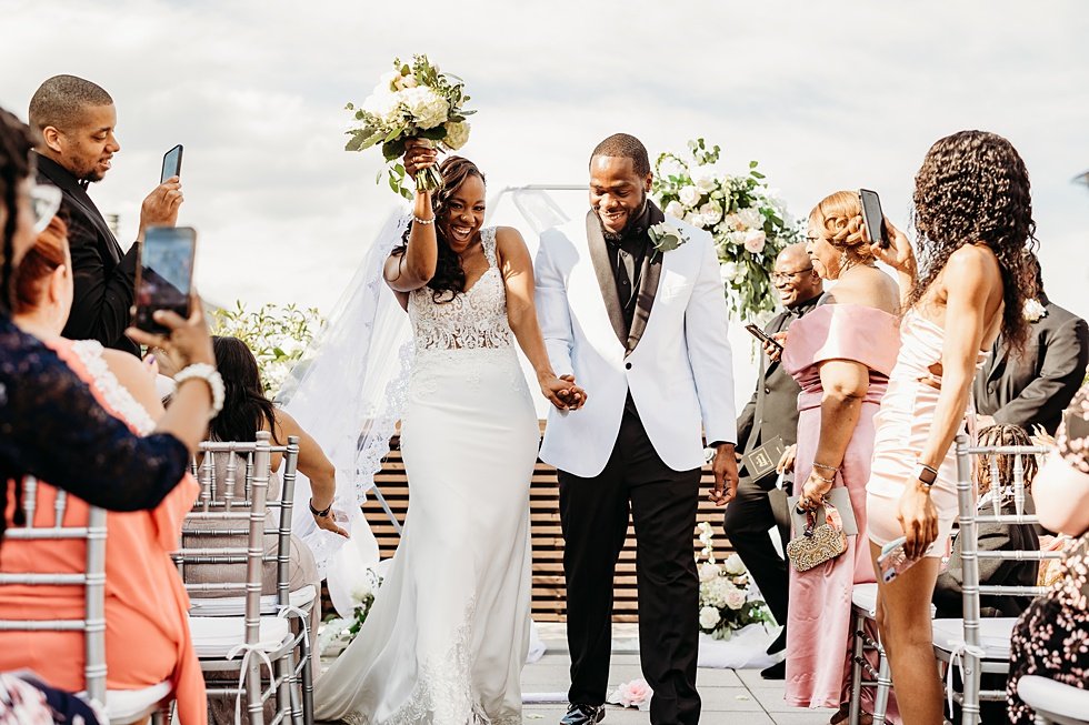  Rooftop wedding ceremony at 21c hotel Louisville.  