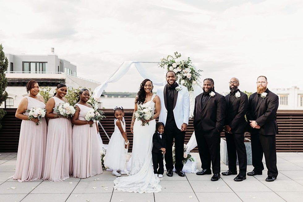  Wedding party posing on rooftop  at 21C Hotel Louisville, Kentucky 