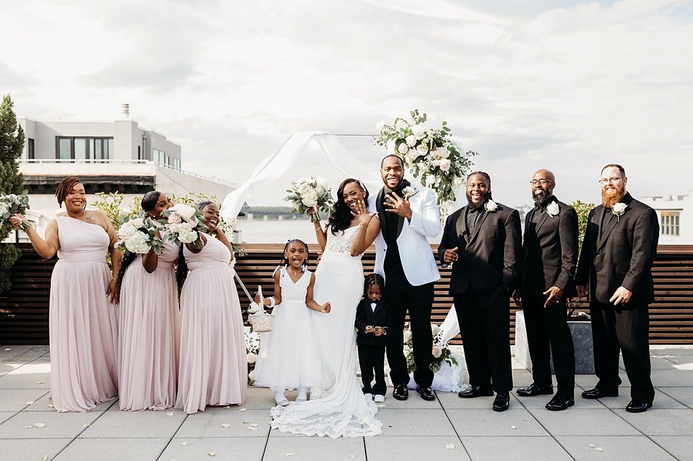  Wedding party posing on rooftop  at 21C Hotel Louisville, Kentucky 