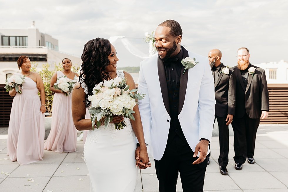  Wedding party posing on rooftop  at 21C Hotel Louisville, Kentucky 