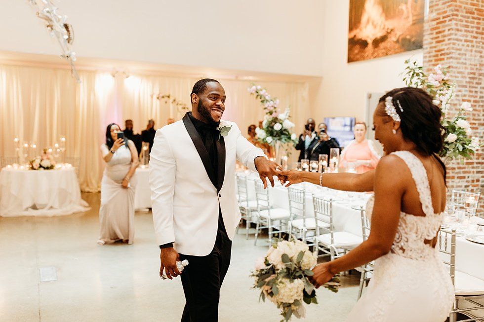  Couple's first dance at 21C. Wedding reception at 21c Hotel Louisville. Rooftop wedding and reception at 21C Hotel Louisville 