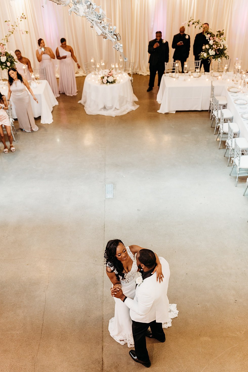  Couple's first dance at 21C. Wedding reception at 21c Hotel Louisville. Rooftop wedding and reception at 21C Hotel Louisville 