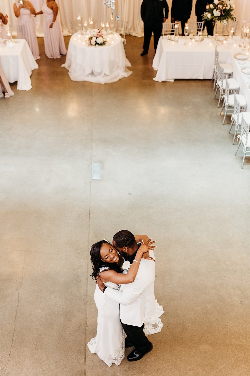  Couple's first dance at 21C. Wedding reception at 21c Hotel Louisville. Rooftop wedding and reception at 21C Hotel Louisville 