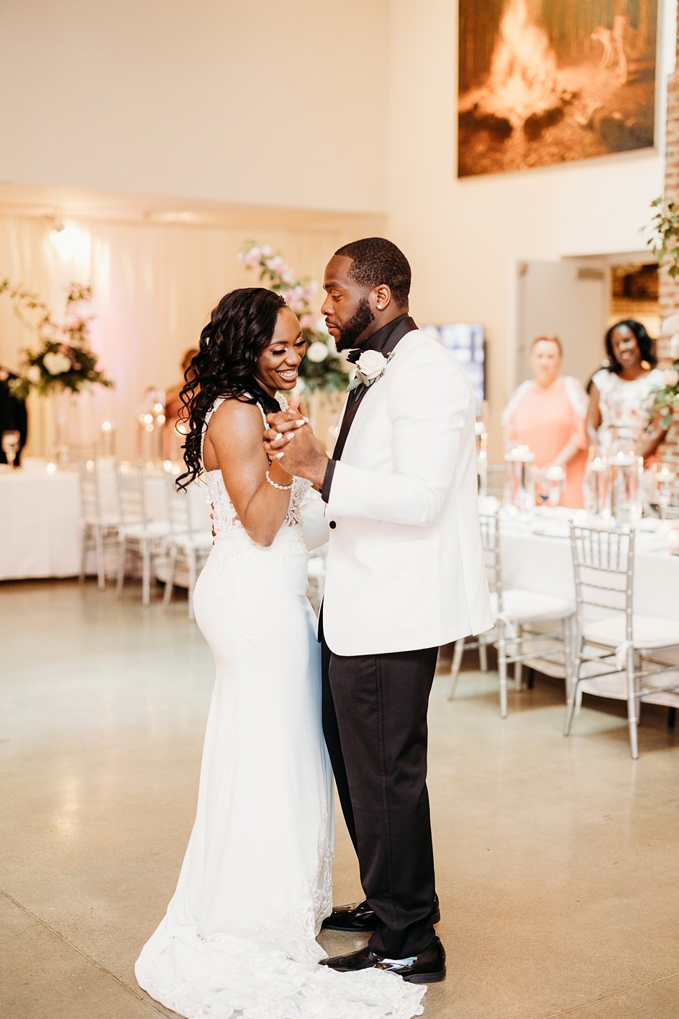  Couple's first dance at 21C. Wedding reception at 21c Hotel Louisville. Rooftop wedding and reception at 21C Hotel Louisville 
