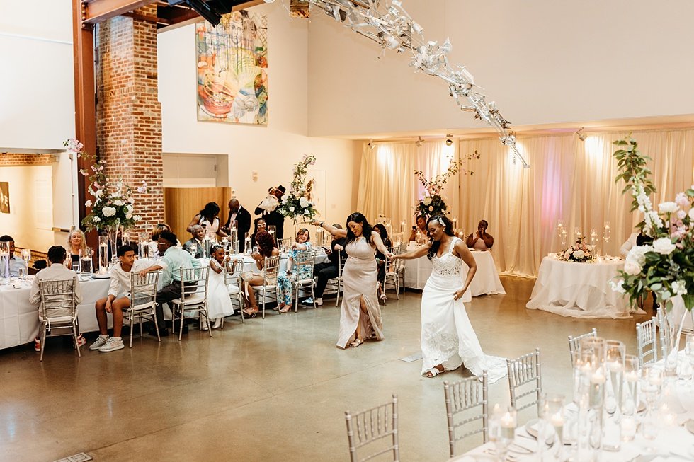  Mother/daughter dance at 21c. Wedding reception at 21c Hotel Louisville. Rooftop wedding and reception at 21C Hotel Louisville 