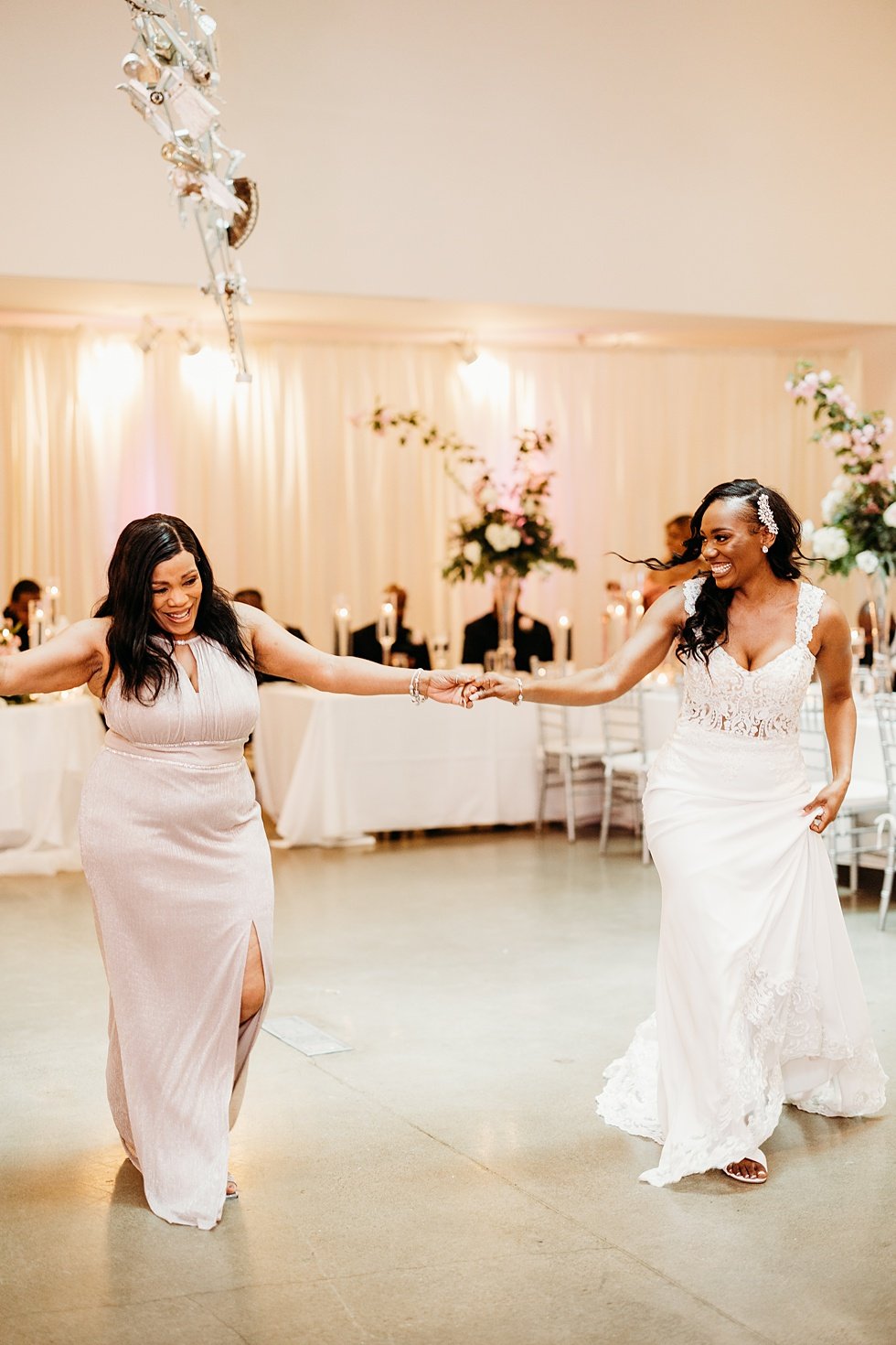  Mother/daughter dance at 21c. Wedding reception at 21c Hotel Louisville. Rooftop wedding and reception at 21C Hotel Louisville 