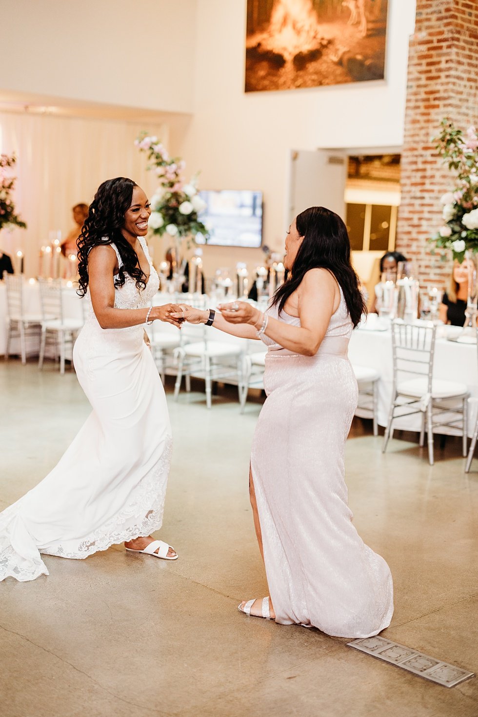  Mother/daughter dance at 21c. Wedding reception at 21c Hotel Louisville. Rooftop wedding and reception at 21C Hotel Louisville 