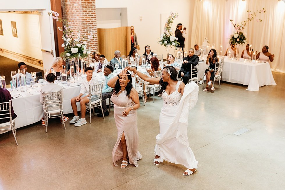  Mother/daughter dance at 21c. Wedding reception at 21c Hotel Louisville. Rooftop wedding and reception at 21C Hotel Louisville 