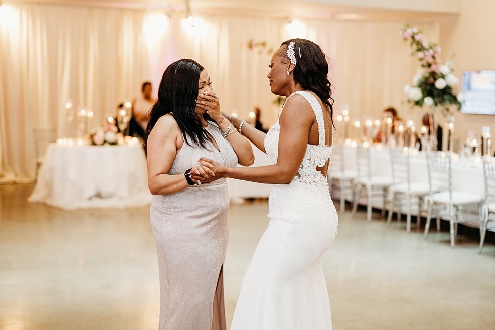  Mother/daughter dance at 21c. Wedding reception at 21c Hotel Louisville. Rooftop wedding and reception at 21C Hotel Louisville 