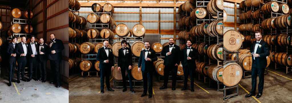 Groom and groomsmen pose with drinks inside bourbon barrel warehouse at Hubers Orchard and Winery.
