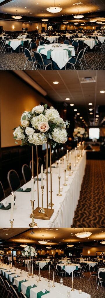 Reception setup in the Harvest Room at Hubers Orchard and Winery with round tables, head table, and tall floral centerpieces with candles.