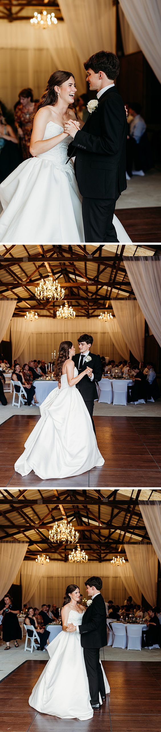 Bride and groom first dance during their barn wedding reception.