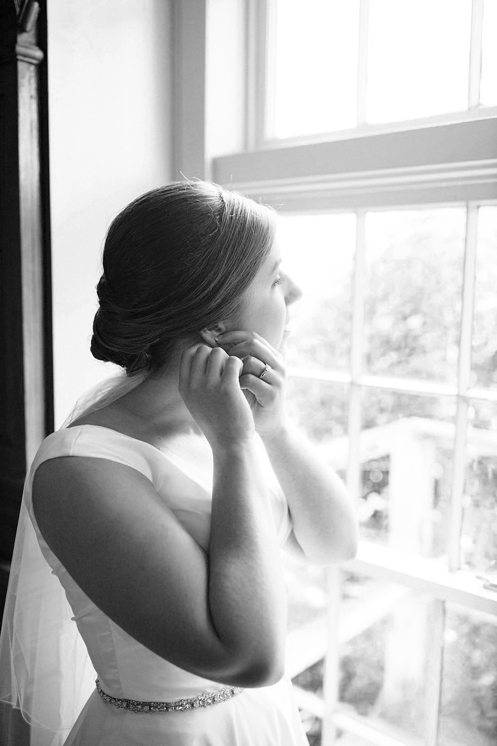 Black and white portrait of bride getting ready at Farmington Historic Home